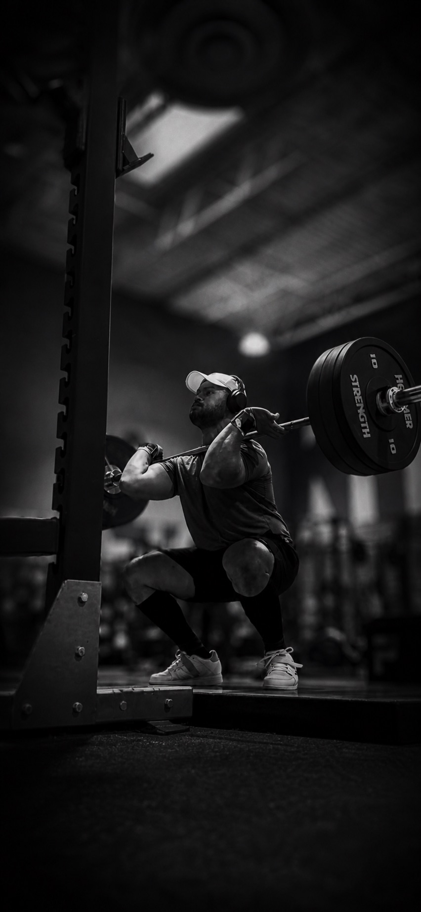 Athlete performing a loaded front squat
